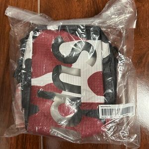 Brand new Supreme neck pouch red camo